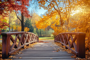 landscape with colorful Autumn forest in park and wooden bridge. Fall season.