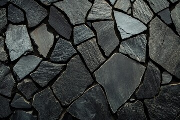 Wall Mural - Textured slate stone surface with varying shapes and shades of gray