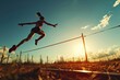 © neirfy - High jump, woman and fitness with exercise, sport and athlete in a competition outdoor. Jumping, workout and training for performance with action, energy and contest with female person and athletics