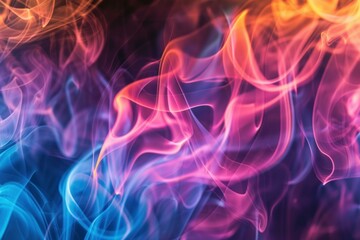 Colorful smoke is swirling and mixing, creating abstract shapes on a black background