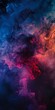 © qorqudlu - A mesmerizing display of colorful swirling smoke art with vibrant hues of red, purple, and blue, set against a dark and mysterious background.