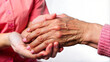 © Margo Miro - Nurse's Hand Holding Elderly Lady's Hand in a Supportive Gesture