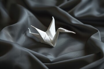 Sticker - Origami crane on crumpled fabric