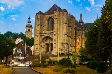 Wall Mural - Picturesque urban landscape with a view of the majestic Catholic Cathedral of St. Waltrude in the small town of Mons, Belgium