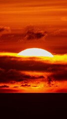Wall Mural - Amazing sun Beautiful light sunset nature Time Lapse golden sky and clouds in sunset time,Beautiful nature landscape background,Sun Timelapse