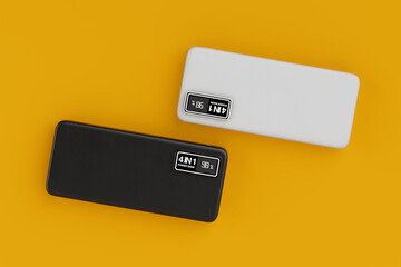 Poster - White and Black Mobile Devices Charging Power Banks. 3d Rendering