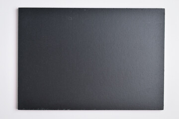 blank black notebook on white background