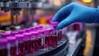 © Old Man Stocker - Laboratory technician in gloves arranges blood sample vials on a high-tech laboratory machine, emphasizing efficiency and precision in medical diagnostics.