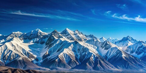 Wall Mural - Snow-capped mountain range under a bright blue sky, snow, mountain, range, snow-capped, winter, cold, landscape, nature, outdoor