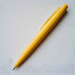 Poster - Vibrant yellow pen laying flat at the center of a light colored surface  This minimalist still life image showcases the simplicity and elegance of a single office supply item perfect for business