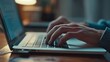 © Ashi - Close-up of hands typing on laptop keyboard, engaging in facebook chat and meeting website, blogger or journalist writing new article, focus on digital communication and content creation