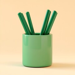 Poster - Elegant green pen holder placed centrally on a clean light colored background  Simple minimalist office or desk accessory for a professional organized workspace