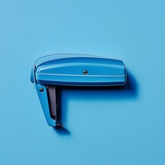 Poster - Centered Blue Stapler Placed on a Plain Simple Surface Ideal for Office Desk or Workplace Decor and Design