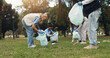 © peopleimages.com - Cleaning, volunteer and people in park with trash collection for sustainability, plastic and ngo project. Solidarity, garbage and hand with bag for charity, community care and social responsibility