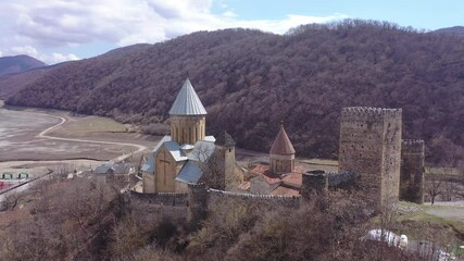 Wall Mural - Scenic view from Ananuri fortress on Aragvi river and Zhinvali reservoir in spring. Georgia