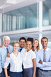 © STEEXBuyout/peopleimages.com - Staff, portrait and group embrace in office, diversity collaboration and finance brokers. Business people, coworking support and partnership in trading, workplace cooperation and audit teamwork