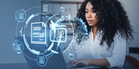 Poster - Woman working on laptop with digital document icons around her.