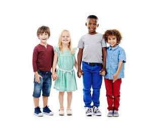 Wall Mural - Kids, group and portrait of friends in studio with smile, bonding and diversity in weekend fashion together. Growth, development and holding hands in style, trendy clothes and fun on white background