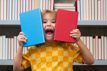 Aufkleber - Pupil read book. Little student on school library. Kid reading book at school. Nerd pupil. Clever intelligent schoolboy overwork. Smart child learning to read book.