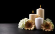 © Marharyta - Funeral Service or Obituary banner - candles and flowers with black copy space