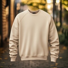 warm beige color blank sweatshirt mock up. A simple beige sweatshirt displayed against a blurred outdoor background, perfect for fashion and clo