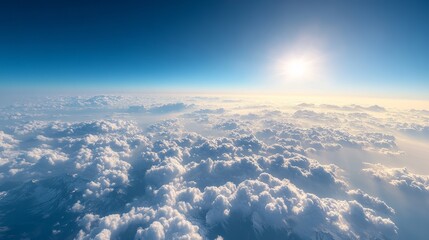 Wall Mural - The view from an airplane reveals a breathtaking panorama of clouds and mountains.