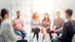 © Mari - 'Group Counseling with Blurred Surroundings: Mental Health Focus' - A circle of people in a therapy session, with the surrounding area blurred to enhance the subject.
