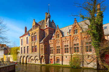 Wall Mural - Canal, boat, tourists in Bruges, Belgium