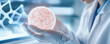 © enterdigital - A scientist examines a glowing cell in a laboratory, highlighting advancements in cellular research and biotechnology.