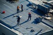 © DK_2020 - A team of professional roofers working on the flat roof of a commercial building