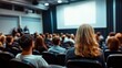 © NusratJahan - Audience watching speaker in auditorium, business presentation with copy space