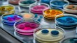 © antusher - Close-up of colorful bacterial colonies in petri dishes, sharp focus, vibrant lab scientific theme.