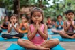 © Yeivaz - Positive children performing yoga exercises. Kids doing gymnastic exercises, family health concept