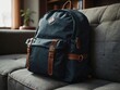 © Kasper - A backpack positioned atop a sofa cushion