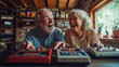 © bird_saranyoo - Older couple enjoying a nostalgic video game on a vintage console, laughing as they reminisce about old times.
