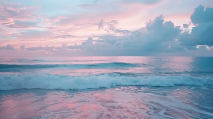 Wall Mural - a serene sunset with pink and blue hues setting over the vast ocean, perfect for travel or nature-in