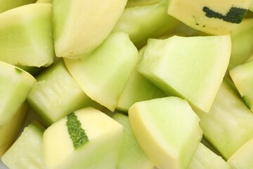 Many pieces of sweet honeydew melon, closeup