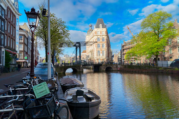 Poster - Facades of old historic Houses and trees over canal water, Amsterdam, Netherlands