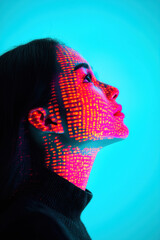 Poster - side profile of a woman with coded lights projected on her face, representing technology and innovat