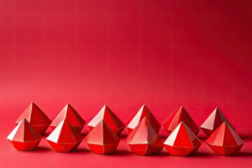 Poster - Vibrant red geometric shapes arranged in a row, creating a striking visual on a bold red background.