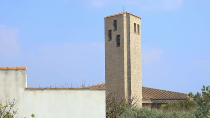 Wall Mural - Bell tower of the Notre-Dame des flots church of La Cotiniere in Saint-Pierre-d'Oléron, France