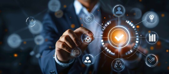 Poster - A professional using a futuristic digital interface in a corporate setting, interacting with business icons. Image shows blend of technology and innovation in business environment