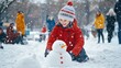 © Alice a. - A young boy is playing in the snow, making a snowman