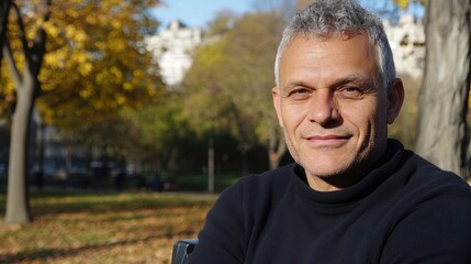 Poster - Mature Man Enjoying Sunny Autumn Day in City Park