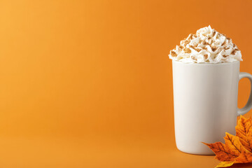 Wall Mural - Cinnamon-spiced pumpkin latte with fall foliage, isolated on a gradient background 