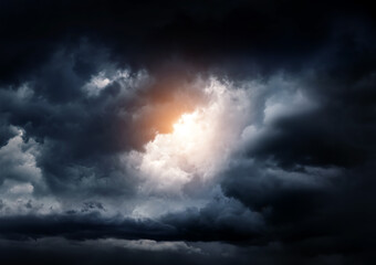 Wall Mural - storm clouds with a sunlight