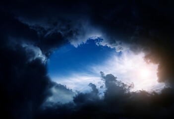 Wall Mural - hole in the storm clouds