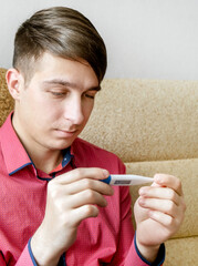 Sticker - Young Man with a Thermometer