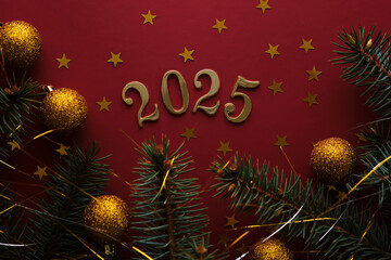 New Year 2025 red background. Number of the coming year in Christmas decoration.