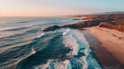 Wall Mural - Drone View of Sandy Beach with Breaking Waves and Rocks: Golden Hour Photography with Clear Weather, 16:9